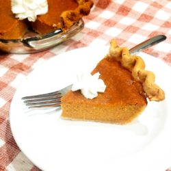 Pumpkin pie with homemade whipped cream