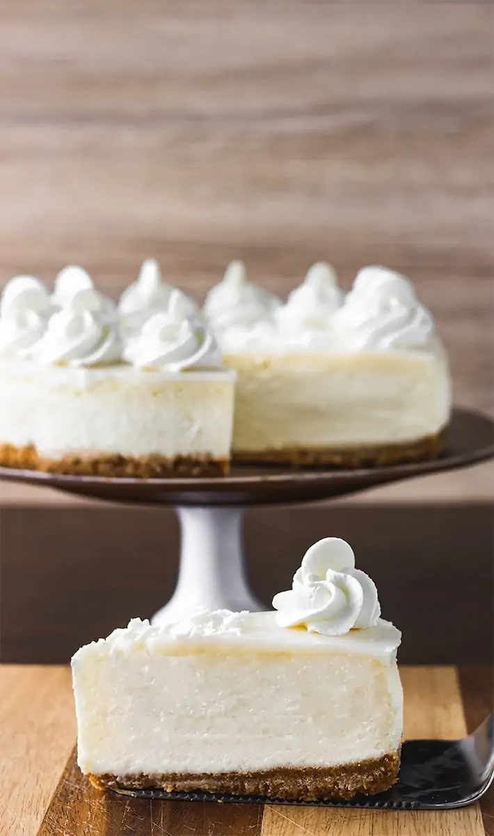 Slice of cheesecake with whipped cream