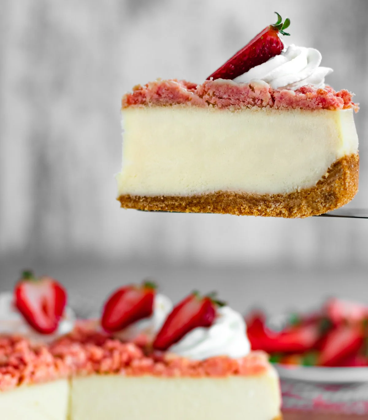 Strawberry Crunch Cheesecake Slice with Whipped Cream