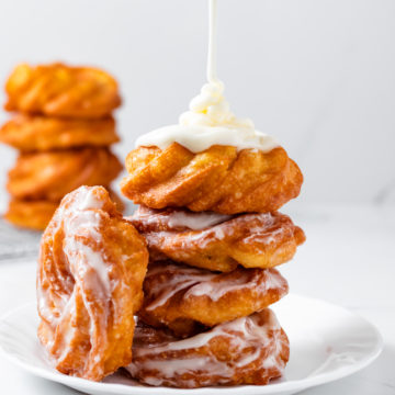 Pouring Glaze on French Cruller Donuts