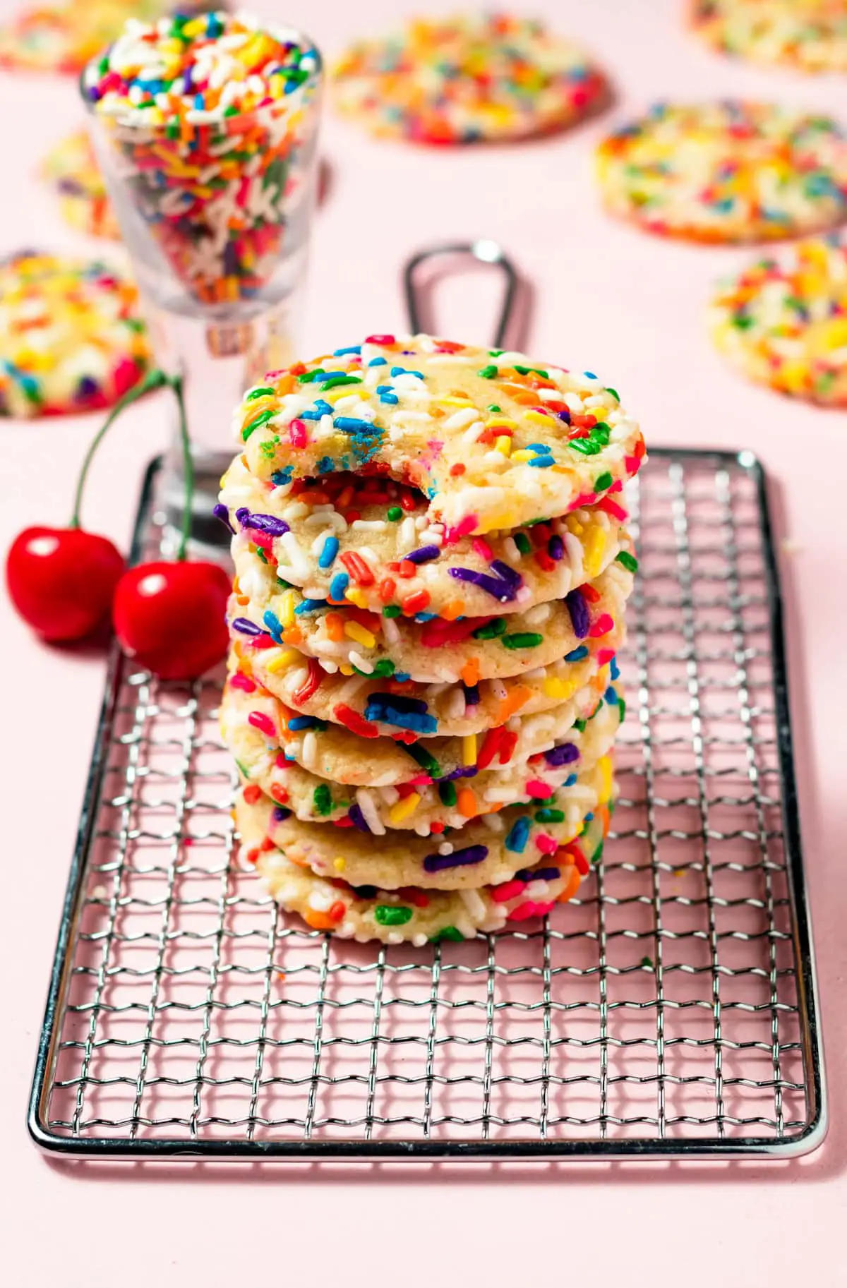 cookies with sprinkles on cooling rack