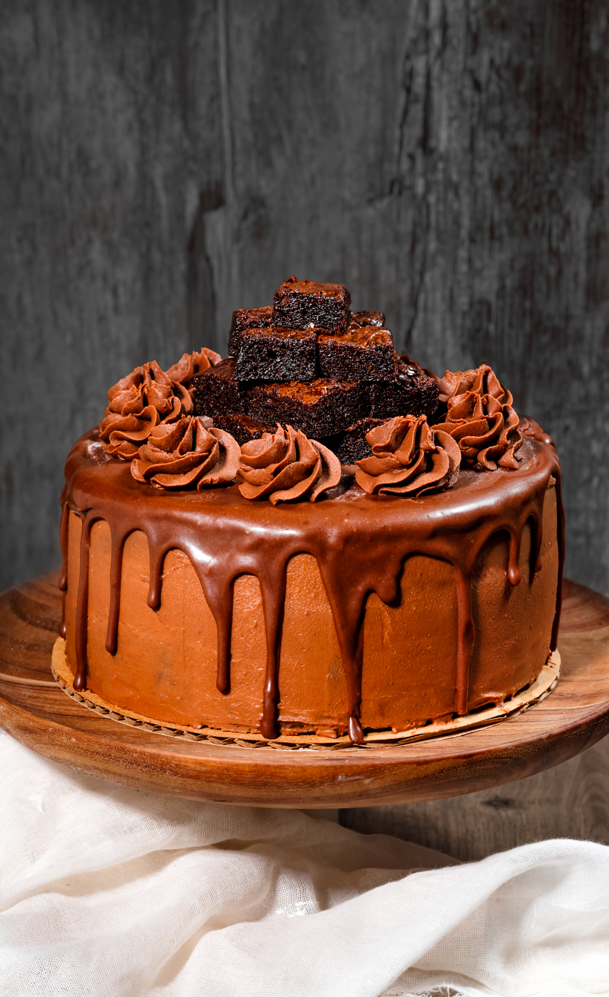 chocolate brownie cake on cake stand