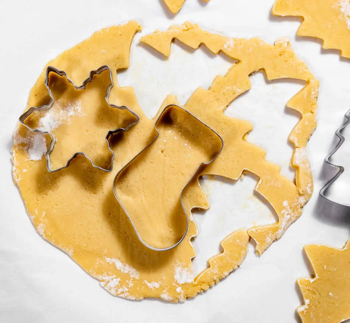 cutting out shapes in cookie dough
