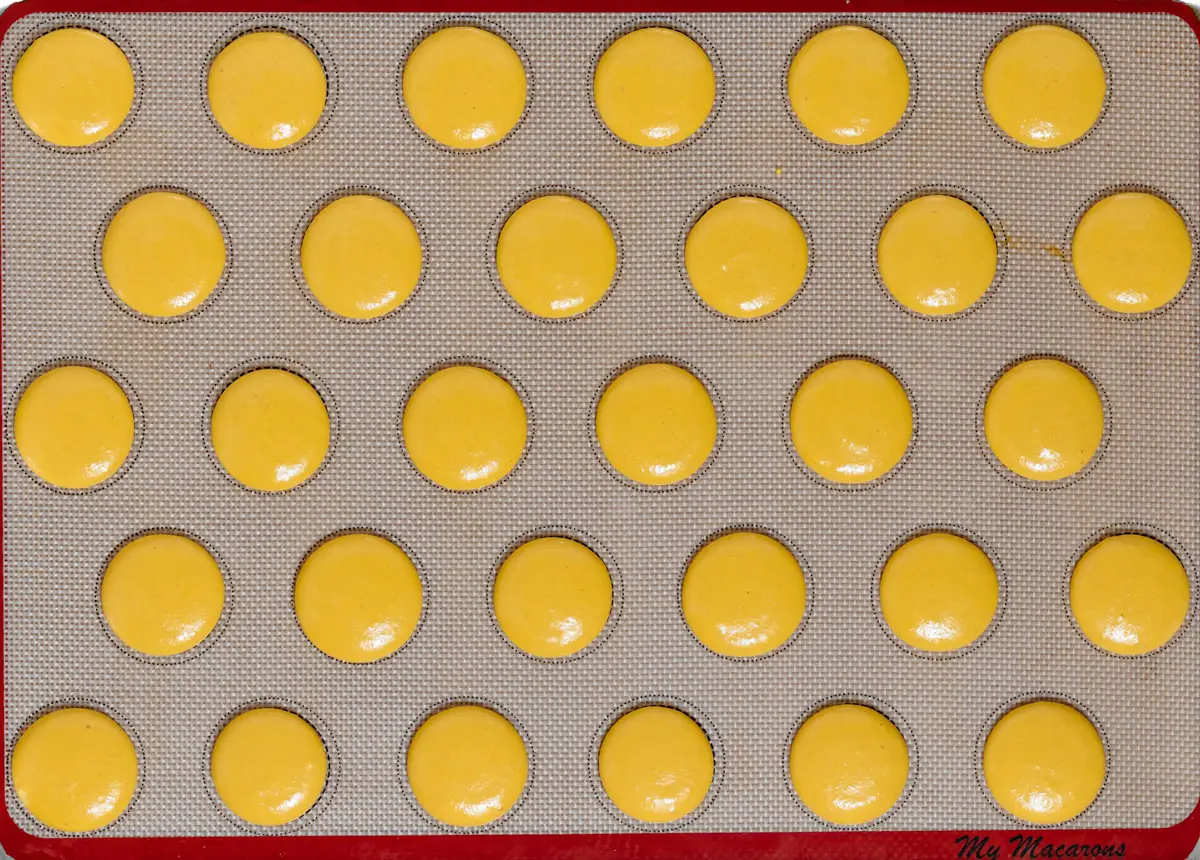 piped macaron batter