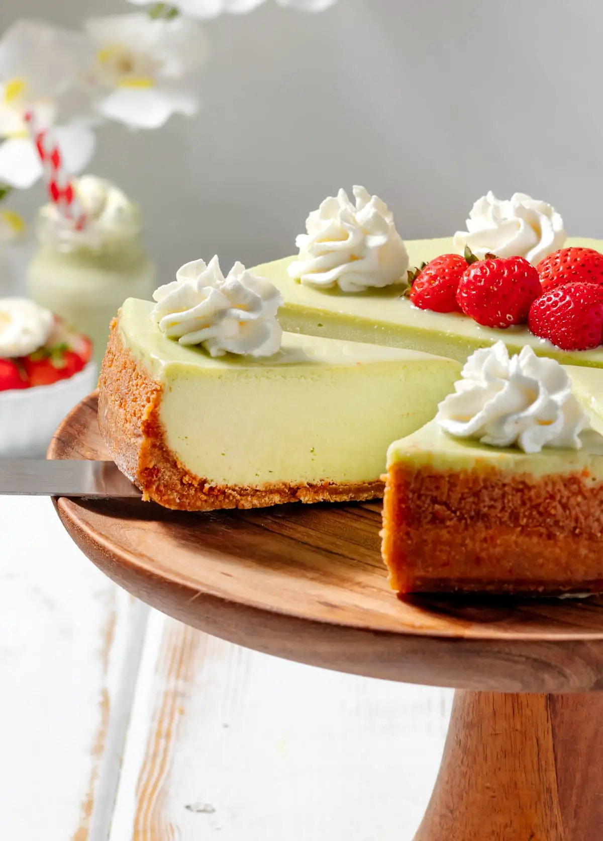 matcha cheesecake with whipped cream